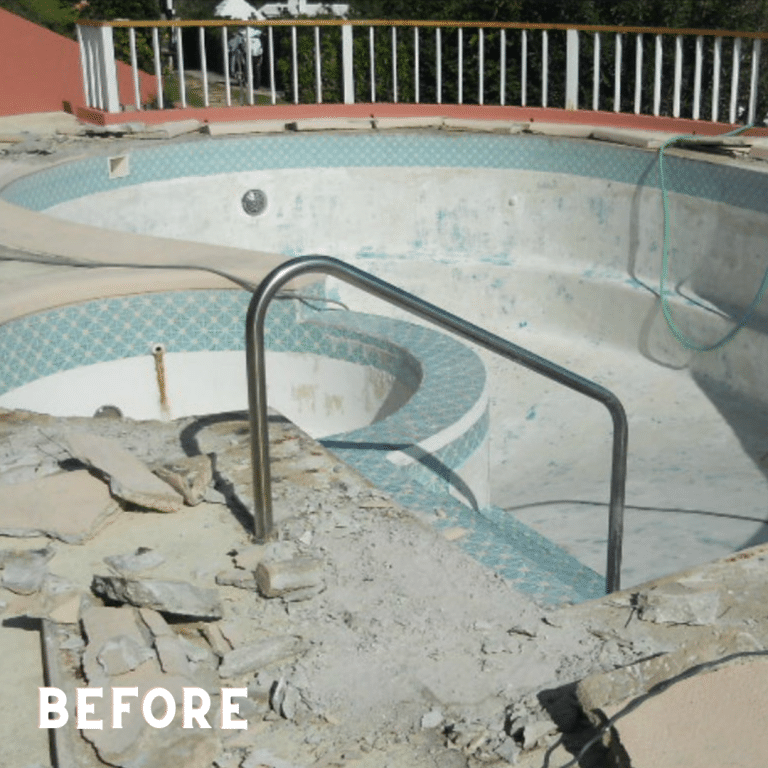 Image of a concrete pool deck with a decorative coating that shows signs of wear and damage. The surface has cracks and chips, and there are areas where the coating has peeled away, revealing the bare concrete underneath.