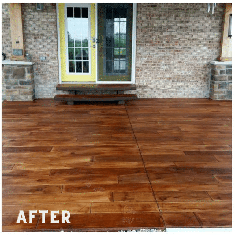 Rustic Concrete Wood Stamped Concrete Patio with a natural wood grain pattern and a matte finish. The patio is surrounded by green foliage and outdoor furniture, creating a relaxing and inviting outdoor space.