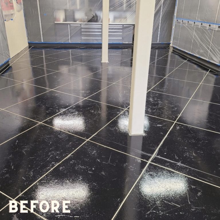 An image showcasing a section of GRANIFLEX Epoxy Flake Flooring. The flooring has a speckled pattern of multicolored flakes on a smooth and glossy surface. The colors range from light beige to brown, gray, and black. The flooring appears to be durable and suitable for both residential and commercial settings.