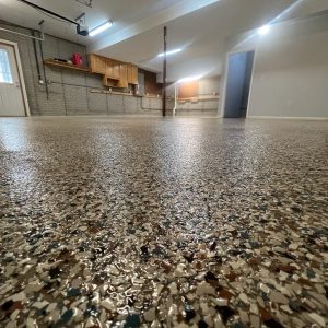 Epoxy Flake Garage Floor Coatings - Durable and Decorative flooring option for garages, with a flake design and glossy finish.